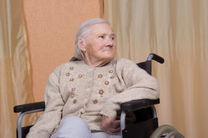 Eighty year old woman sitting in a wheelchair